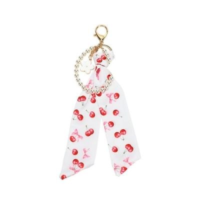 Μπομπονιέρες βάπτισης charm με μαντιλάκι και πέρλες cherry Soap Tales