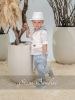 eeeeeeeeeΒαπτιστικά ρούχα αγόρι Stova Bambini σετ B9 με λευκό ασύμμετρο γιλέκο με πέτο, λευκό πουκάμισο, σιέλ παντελόνι, σιέλ loafers και λευκό καπέλο.