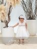 eeeeeeeeeΒαπτιστικό φόρεμα κορίτσι Stova Bambini SS26 σε ιβουάρ απόχρωση με δαντελένιο μπούστο, ανάγλυφα λουλούδια στη μέση, φούστα από τούλι και ασορτί κορδέλα.