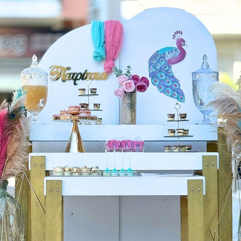 Candy bar βάπτισης με θέμα το παγώνι